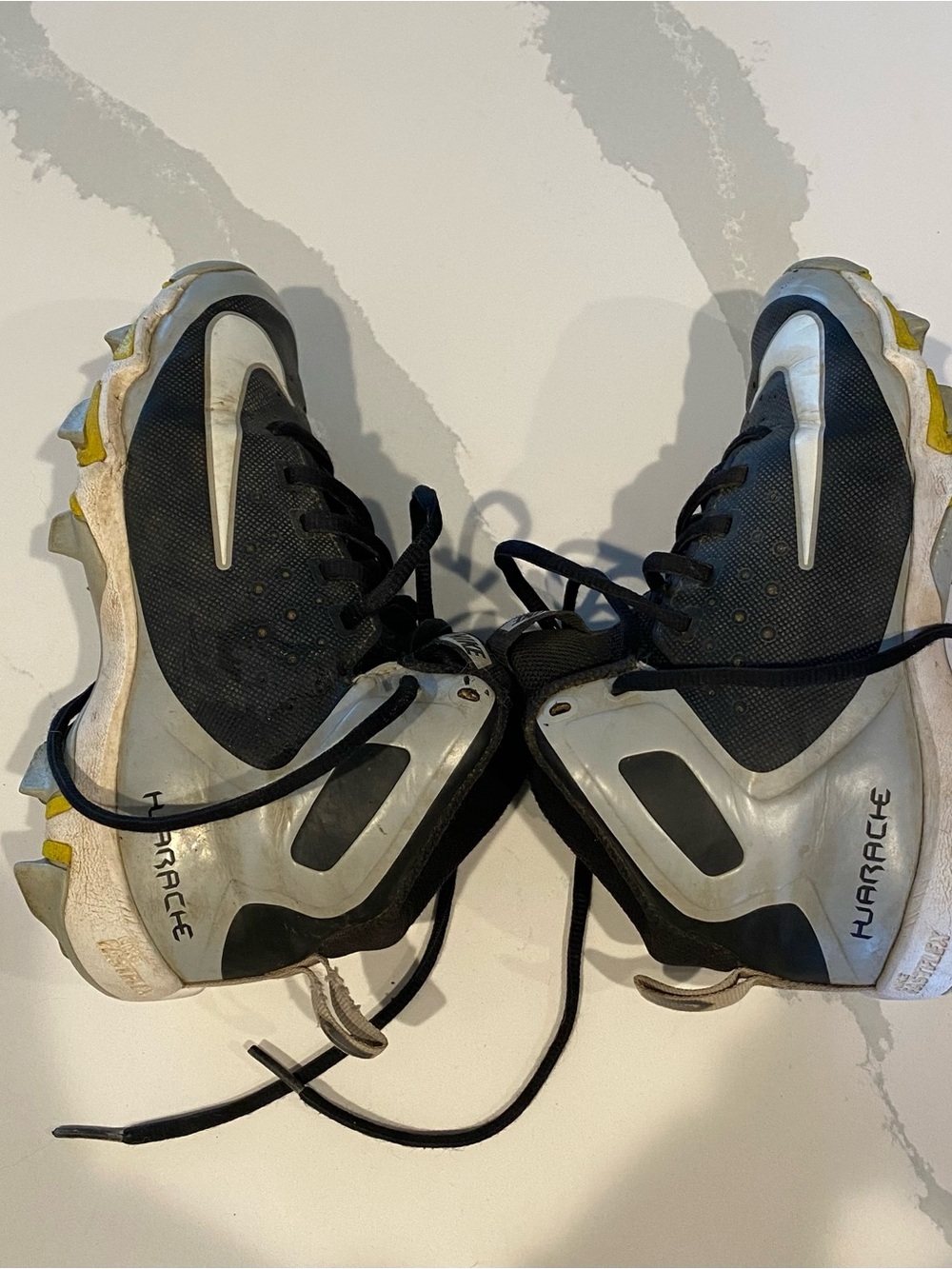 Nike Black and White Baseball Cleats with Yellow Studs